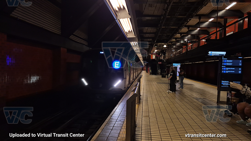 R211 E train at Jamaica-Van Wyck 
An 2 Av-bound R211 E train arrives at Jamaica-Van Wyck. Due to track maintenance, E trains were rerouted on the F line from West 4th Street-Washington Square to 2nd Avenue. This R211 was used for CBTC testing along the IND Queens Boulevard line.
