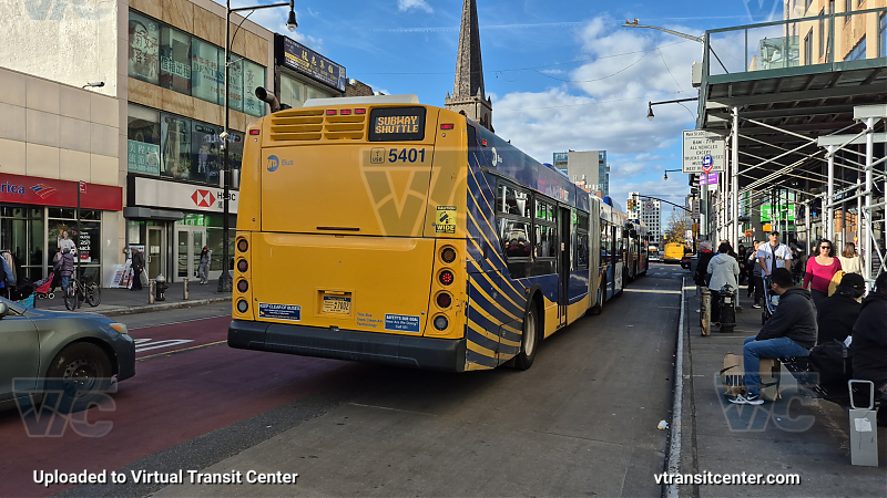 MTA New York City 5401 on the T321 7 shuttle 
2015 NFI XD60 #5401 on the T321 7 shuttle 
