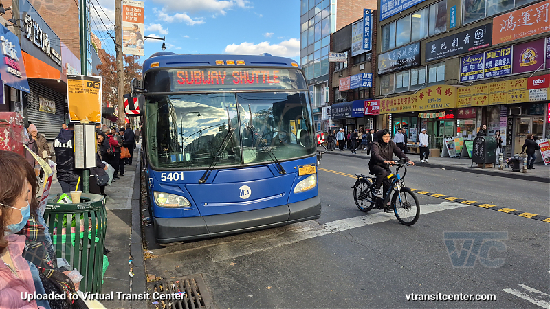 MTA New York City 5401 on the T321 7 shuttle 
2015 NFI XD60 #5401 on the T321 7 shuttle 
