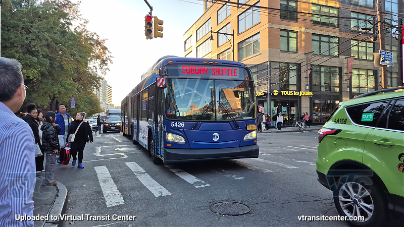 MTA New York City 5426 on the T321 7 shuttle 
2015 NFI XD60 #5426 on the T321 7 shuttle 
