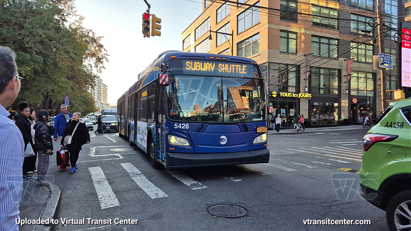 MTA New York City 5426 on the T321 7 shuttle 
2015 NFI XD60 #5426 on the T321 7 shuttle 

