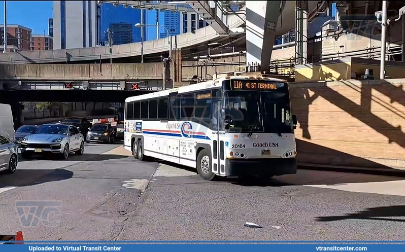 NJ Transit 20164 on route 11A Coach USA 
Coach USA Route 11A
MCI D4500CT
10th Avenue at W 40th Street, New York City, NY
Keywords: CUSA;NJTBus;D4500CT
