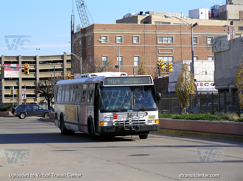 NJ Transit 3711 on Route 404
Route 404 Cherry Hill Mall
December 2nd 2006
OLYMPUS DIGITAL CAMERA

