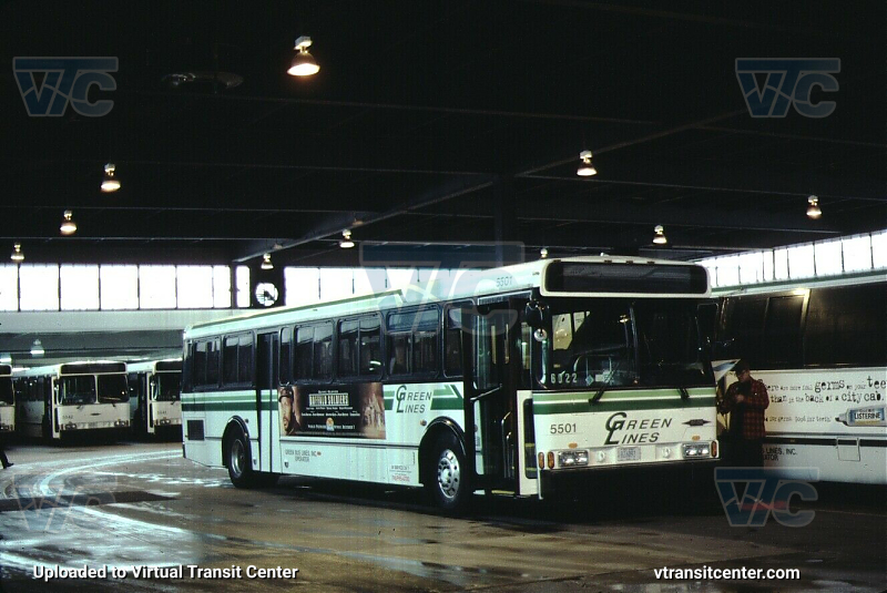 Green Lines 5501 
Green Lines 5501 inside the Green Lines JFK Depot, it appears to be brand new in 1997 as there are unpainted Orions in the background. Photographer unknown. 
Keywords: green lines;orion v